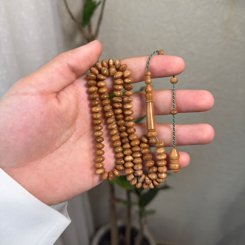 مسباح كوك " ذروي " بخيط زيتي و عشبي "